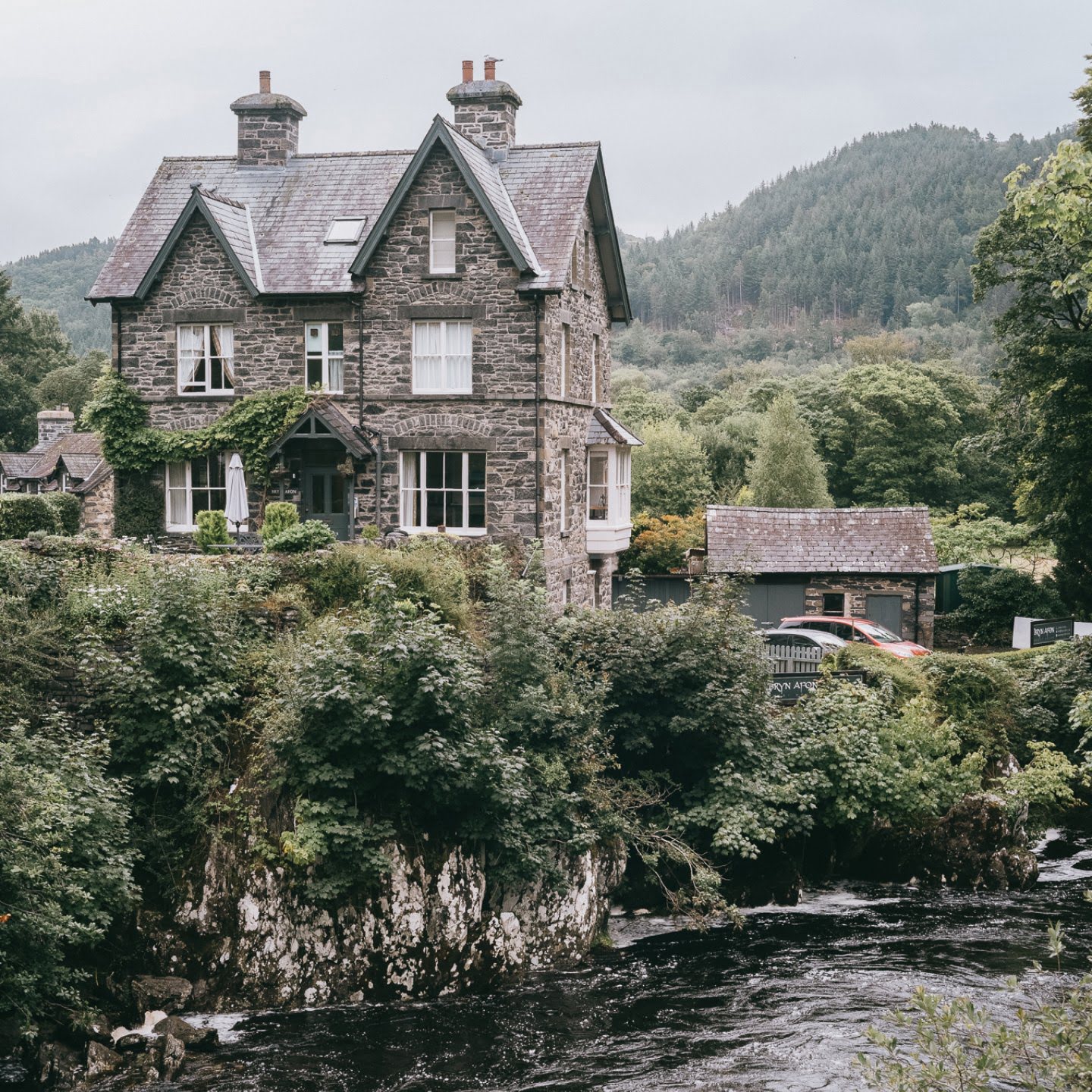A small hotel perched on the edge of a deep river valley in the welsh countryside